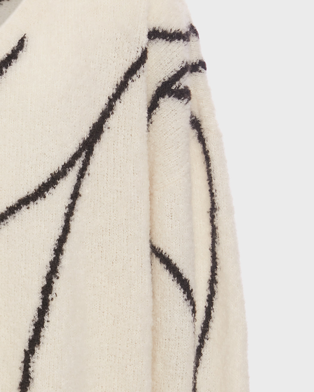 ARTIST OVERSIZED V-NECK KNITWEAR